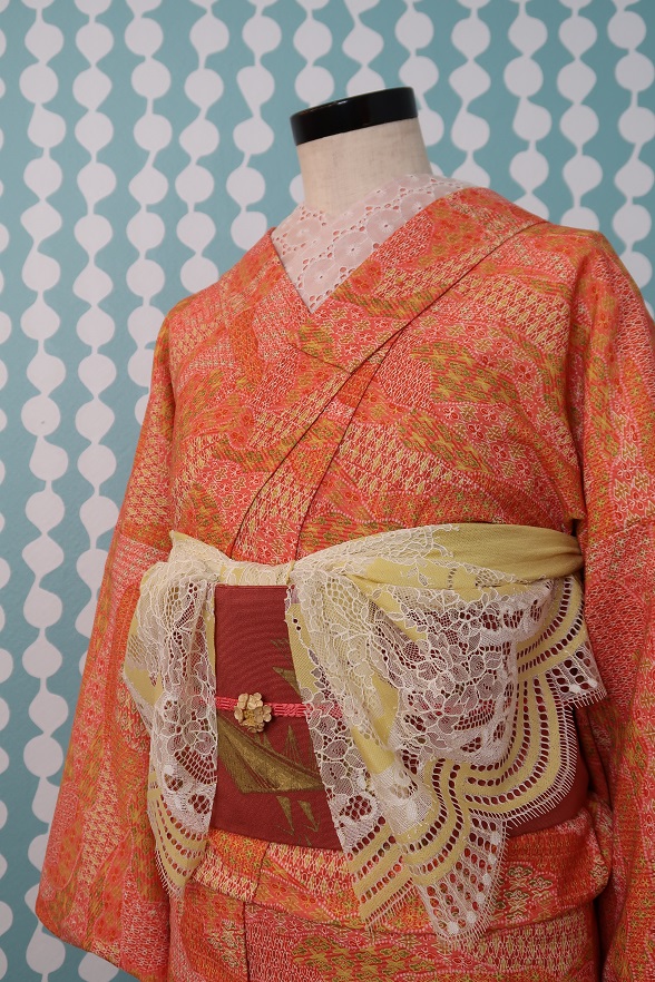 ふんわりピンクオレンジの幾何学柄ウール単衣きもの【身丈148.5cm】